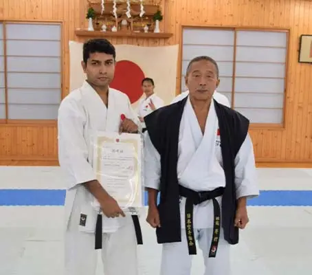 JKA Shotokan Karate Club Dubai receiving official JKA Branch Certificate at JKA HQ Japan