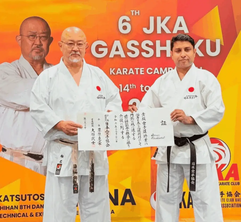Sensei Ameer Adukkattil receiving 6th Dan JKA Diploma from Shiina Shihan Technical Director of JKA Japan